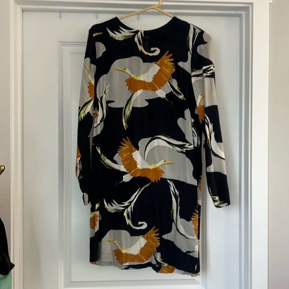 Mod style mini dress from h&m. Size four, missing middle button.